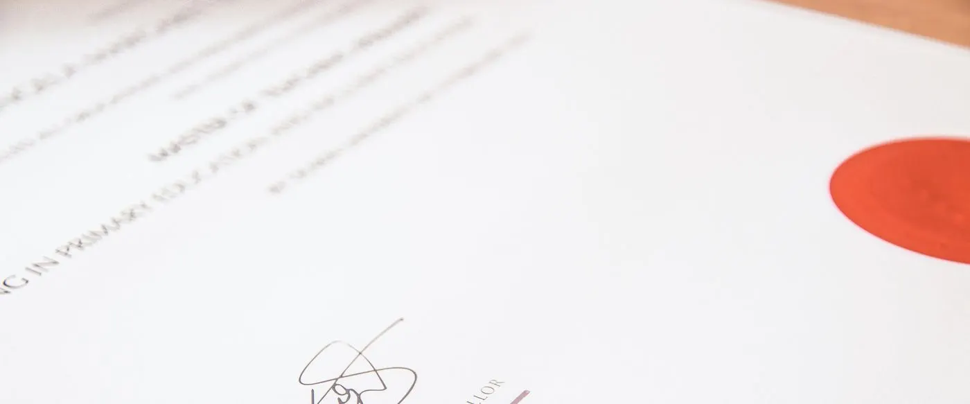 A certificate carrying signatures and an embossed red seal